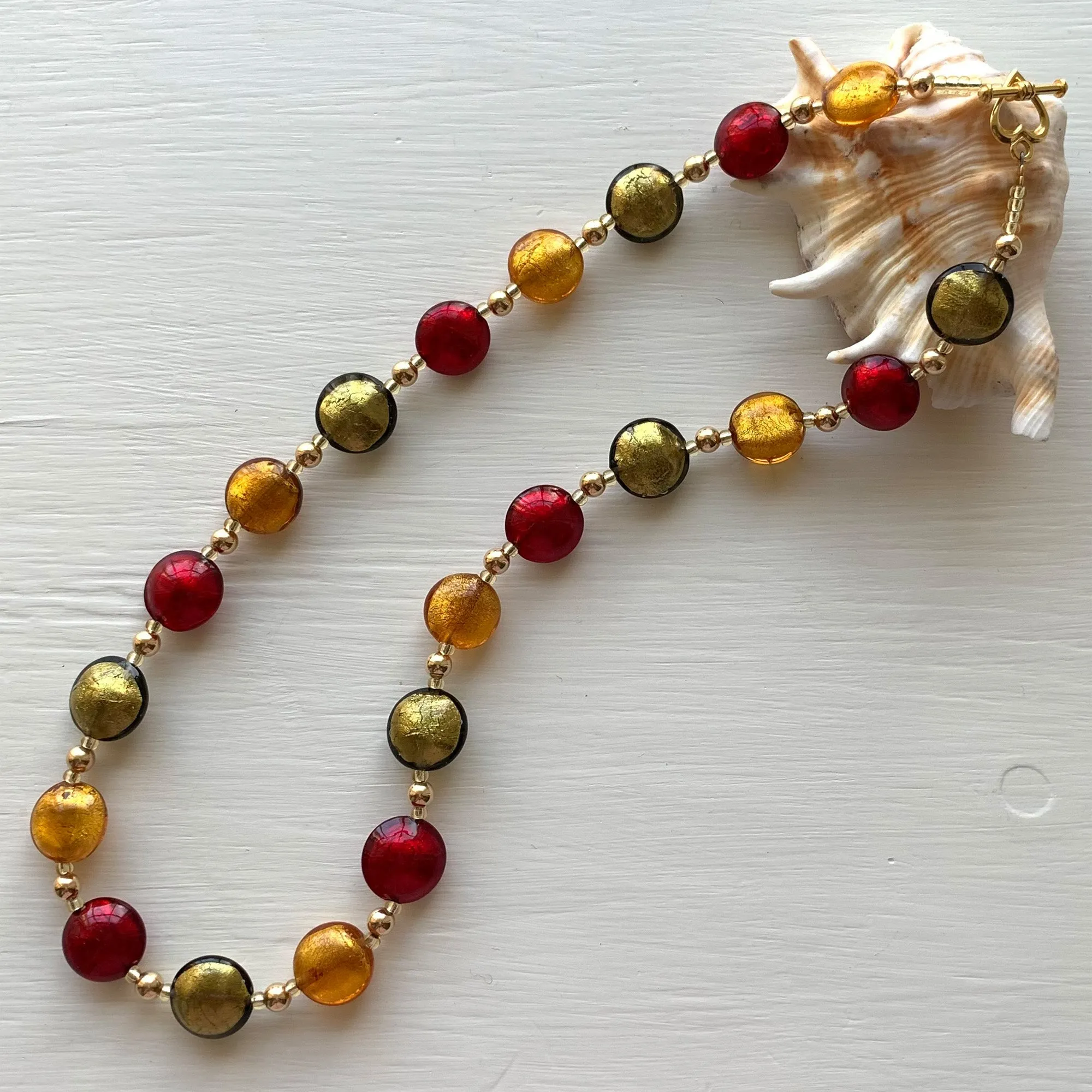 Necklace with gold topaz (amber), grey and red Murano glass small lentil beads on gold