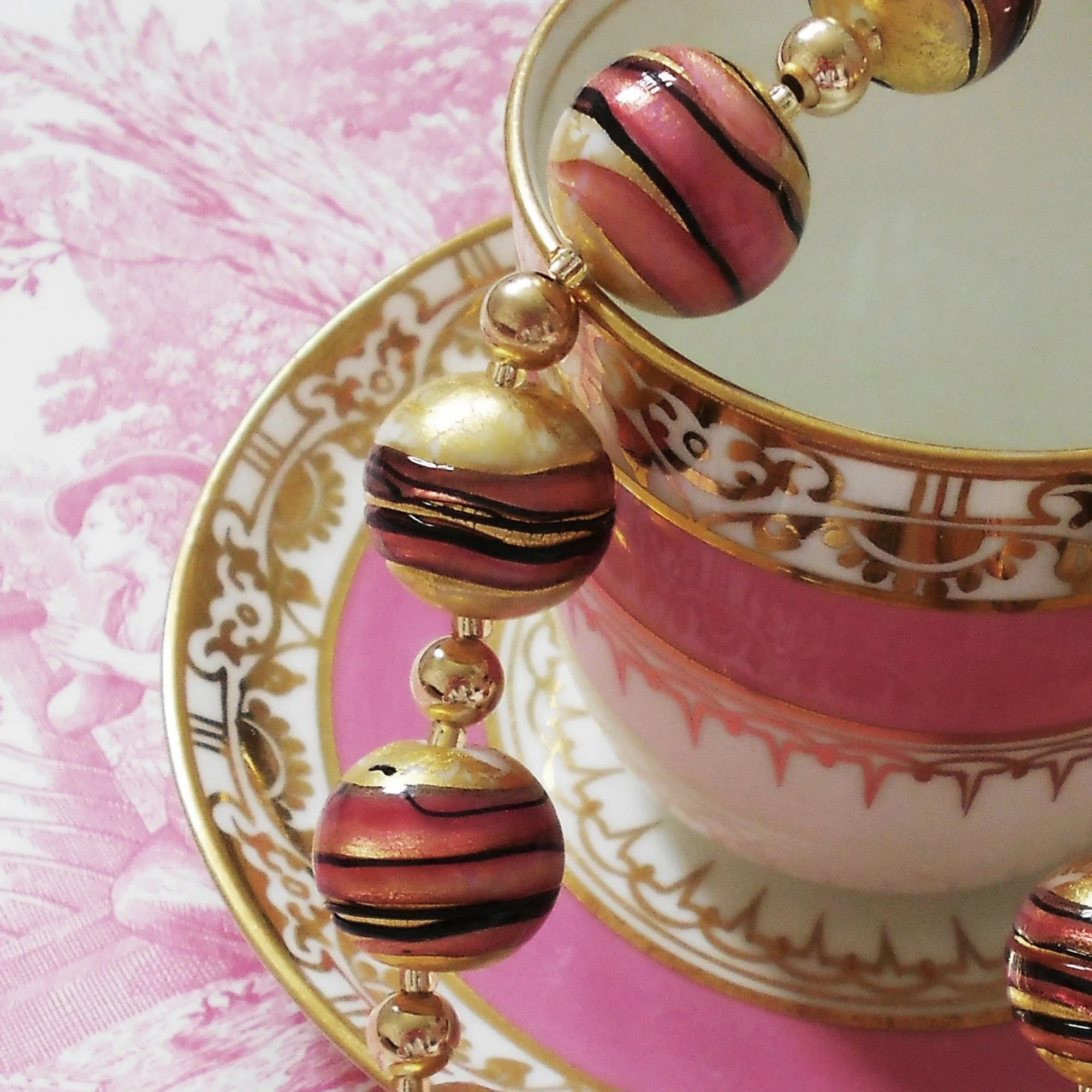 Necklace with pink black appliqué gold white pastel Murano glass sphere beads on gold