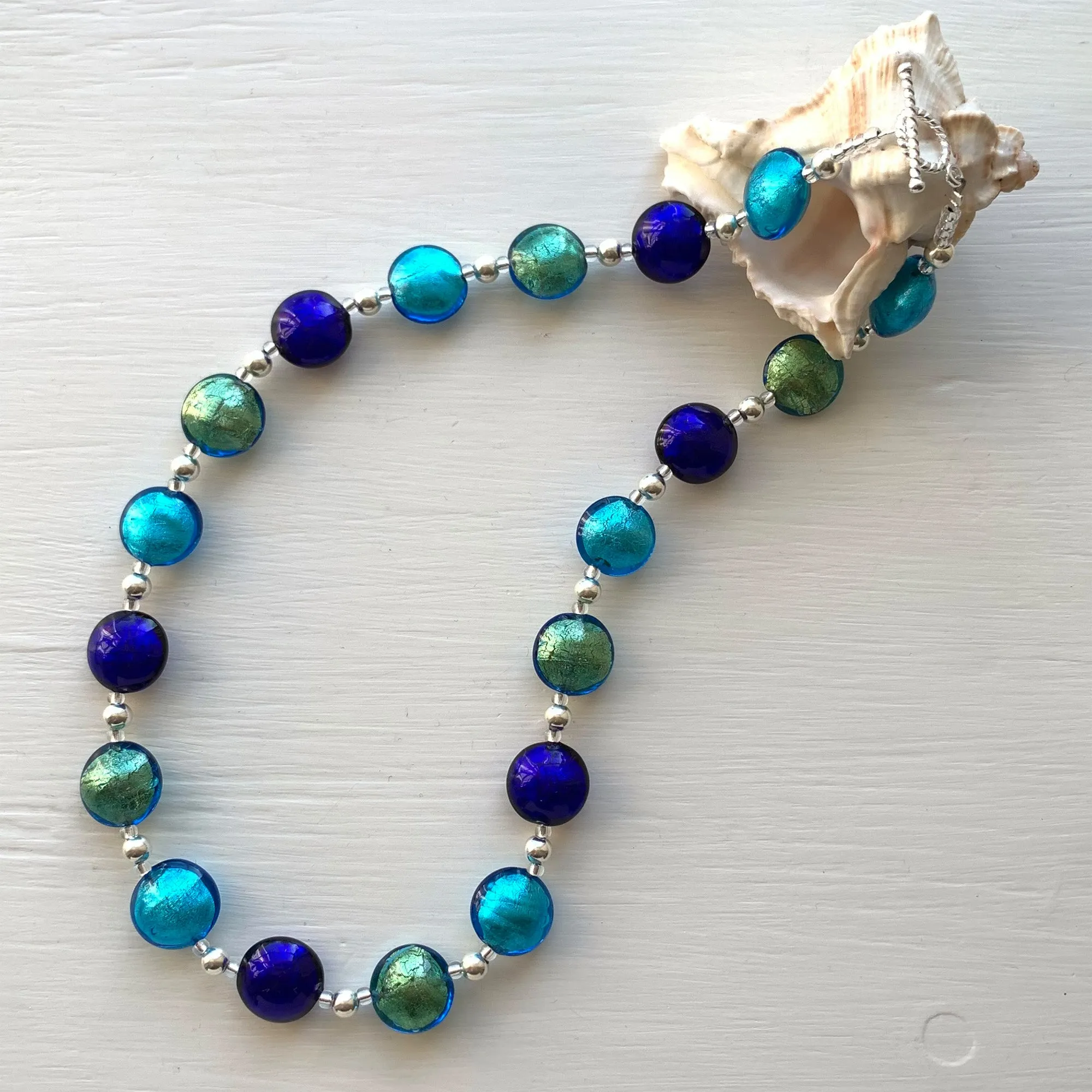 Necklace with three shades of sea blue Murano glass small lentil beads on silver